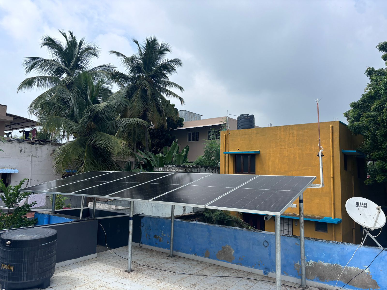 Eco-friendly home with solar panels and a beautiful garden